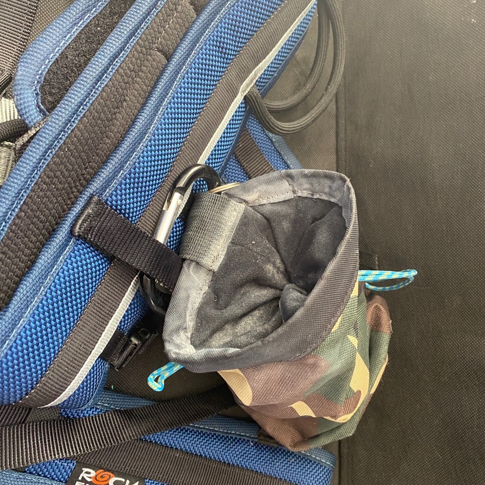 Climbing belt with pouch